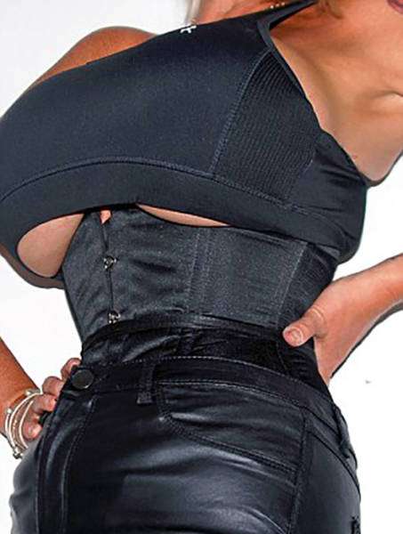 Британка Шарон Перкінс не може зупинитися і постійно збільшує свою груди (15 фото)