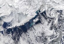 Alaska’s Winter Finale: A Satellite View of Polar Storms and Swirling Clouds